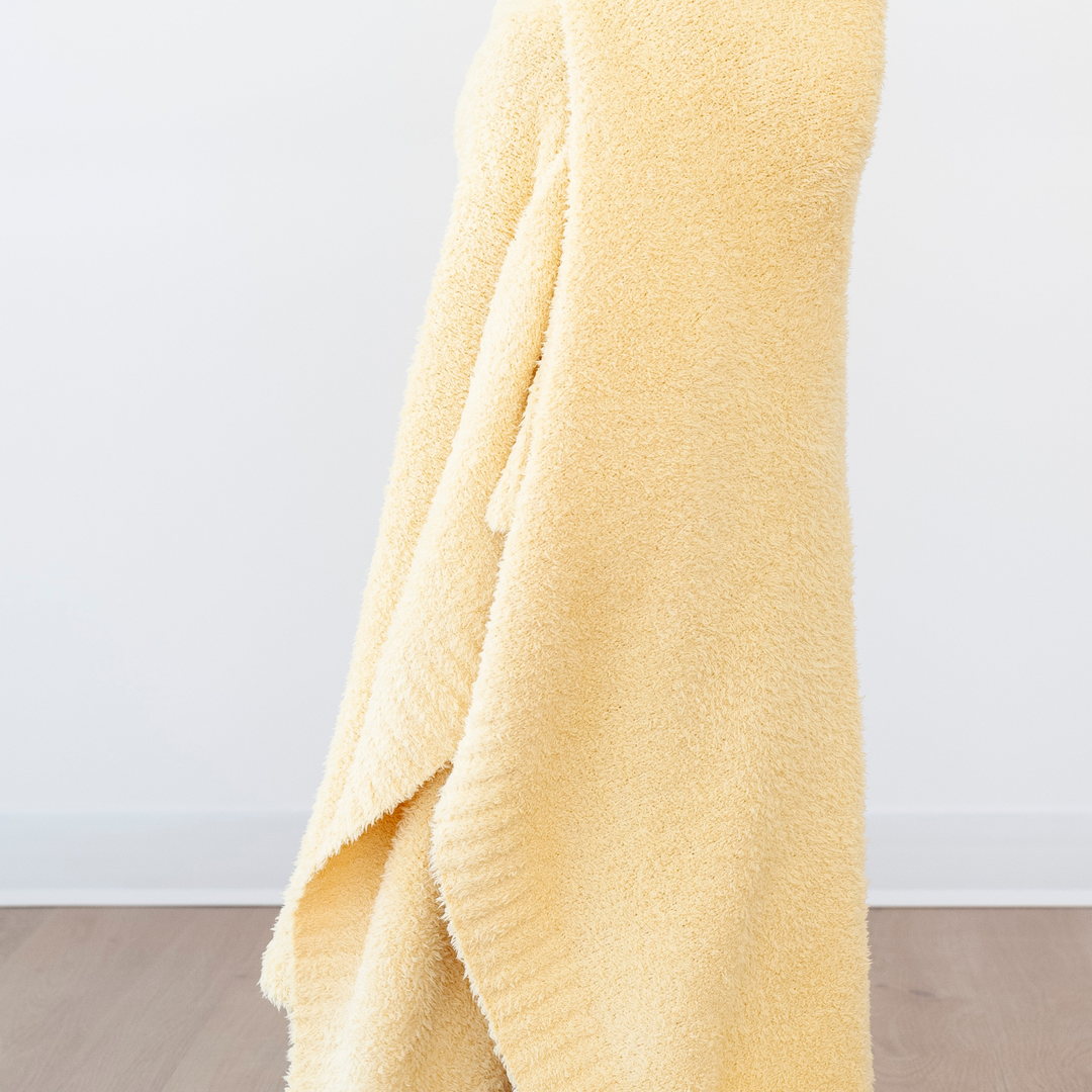 Little ones will love the bright Sunburst Saranoni BAMBONI¨ Toddler Blanket, ideal for best blankets for toddlers.