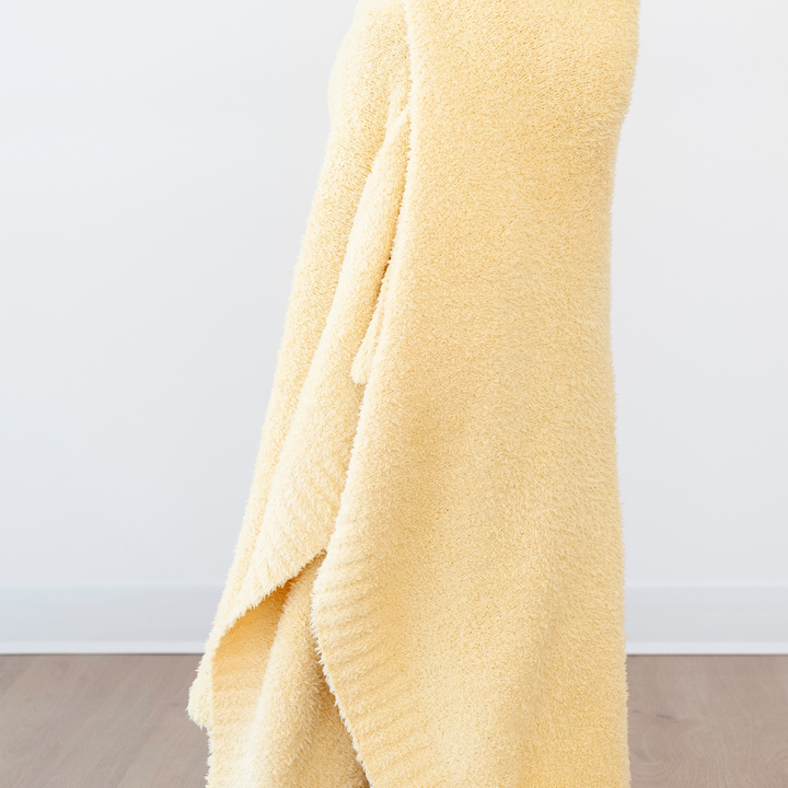 Little ones will love the bright Sunburst Saranoni BAMBONI¨ Toddler Blanket, ideal for best blankets for toddlers.