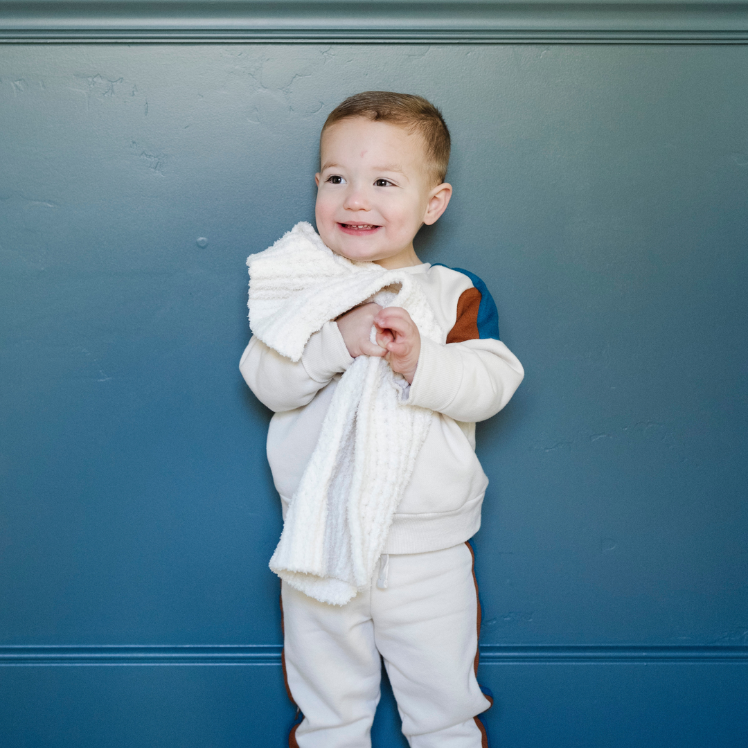 Warm loft and cozy texture appear on the Saranoni Waffle Knit Mini Blanket in Swan, supporting easy snuggles for Baby blankets.