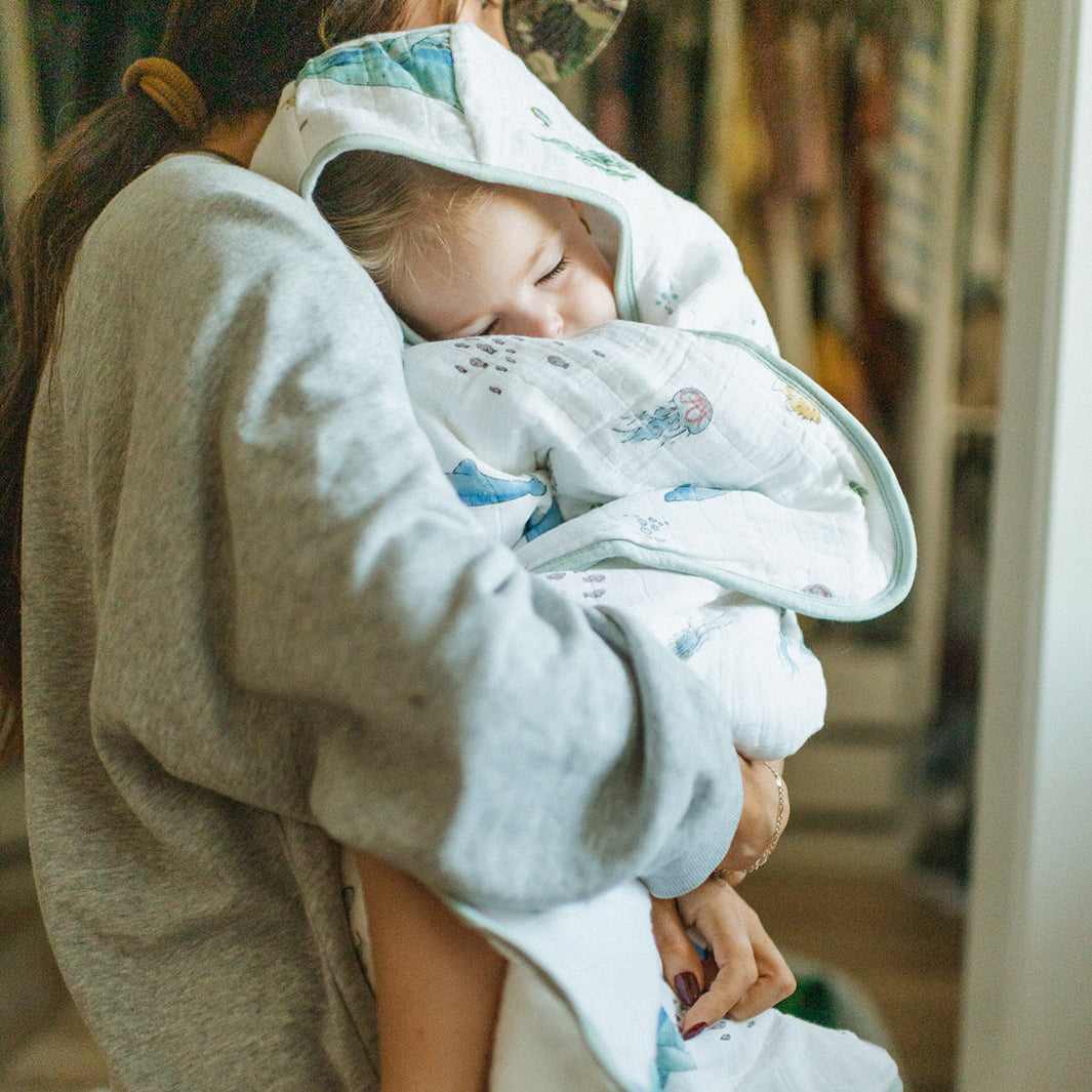 Absorbent baby hooded towel from Little Unicorn, Toddler Hooded Towel - Whales, keeps toddlers warm and comfy after bath