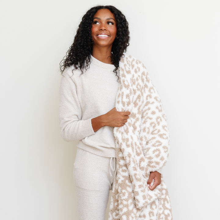 Elevate nap time with the Saranoni Double-Layer BAMONI¨ Throw Blanket in Tan Leopard Luxe, celebrated among best toddler blankets.