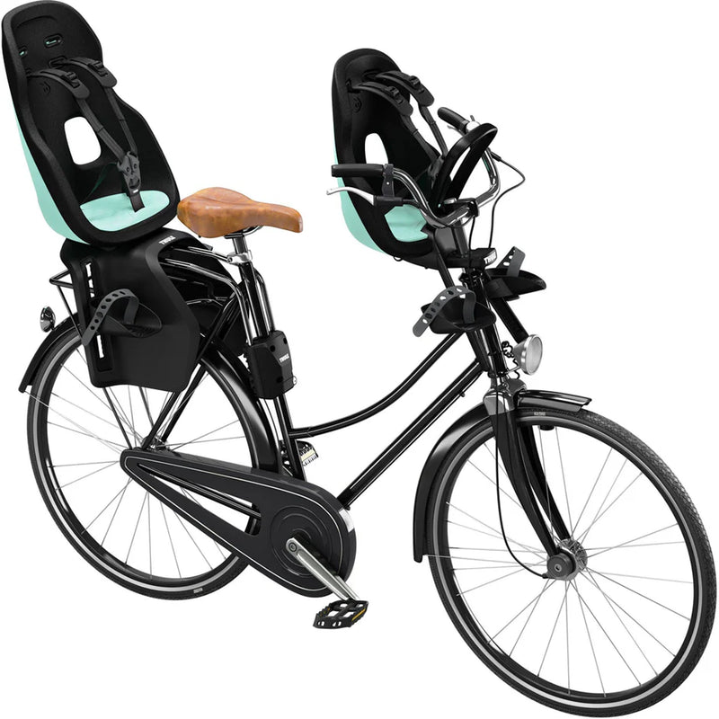 Thule Yepp Nexxt2 Mini in mint green, a stylish and ergonomic bike seat.