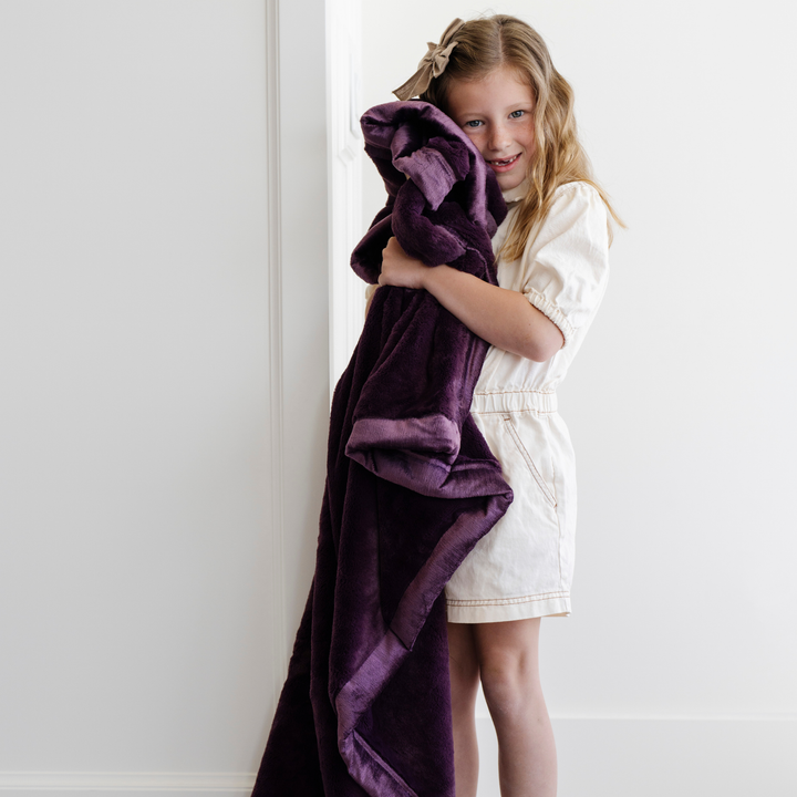 The Saranoni Lush Toddler Blanket in Aubergine provides plush warmth as a best blankets for toddlers choice.