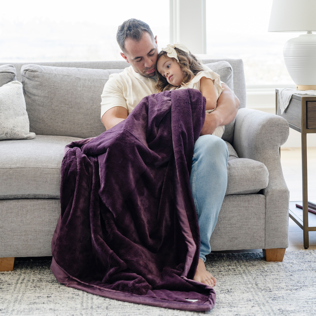 Bring cozy luxury with the Saranoni Lush Toddler Blanket in Aubergine, a soft baby blanket perfect for any room.