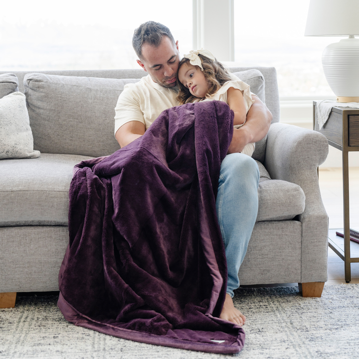 Bring cozy luxury with the Saranoni Lush Toddler Blanket in Aubergine, a soft baby blanket perfect for any room.