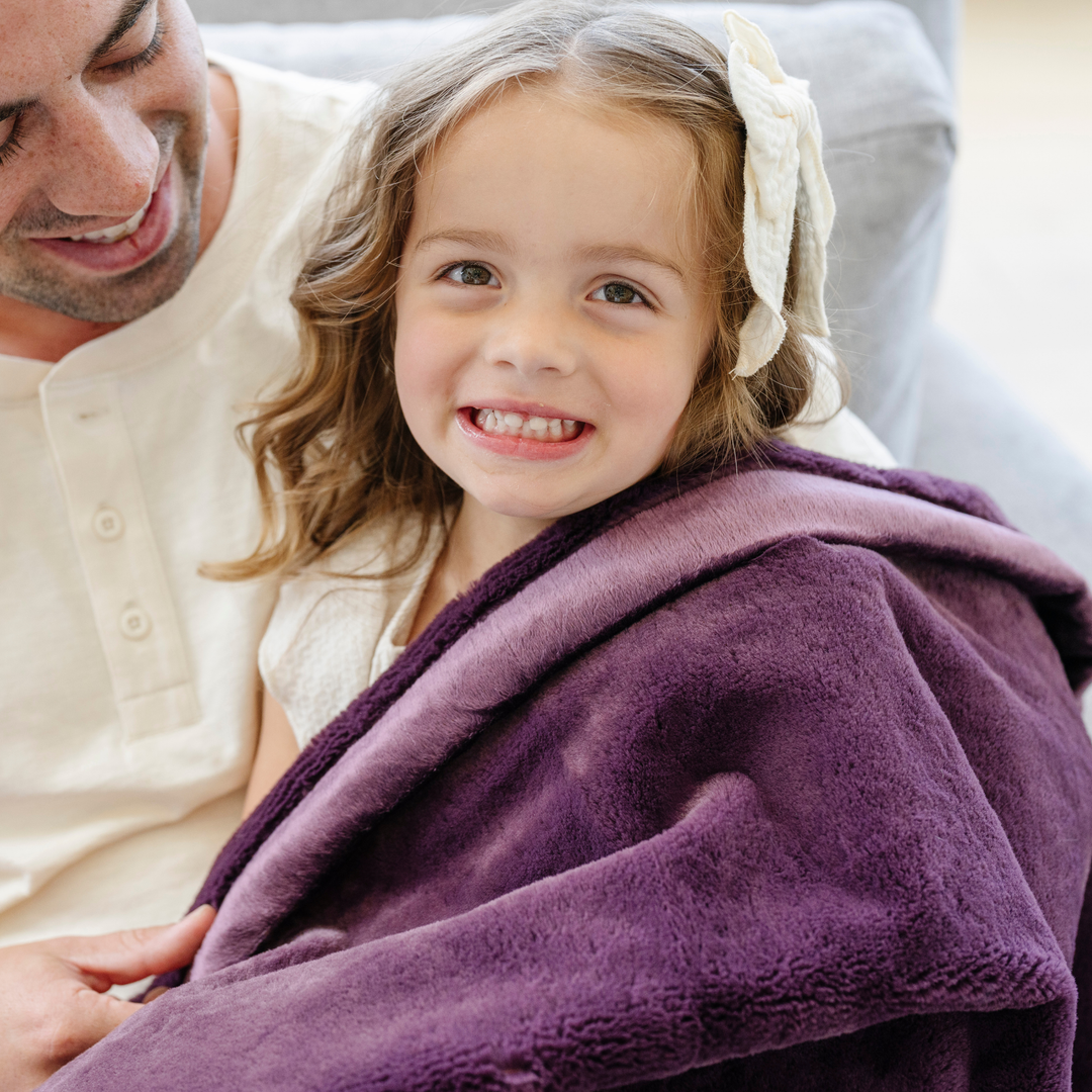 Wrap toddlers in comfort with the Saranoni Lush Toddler Blanket in Aubergine, ideal as a toddler blankets essential.