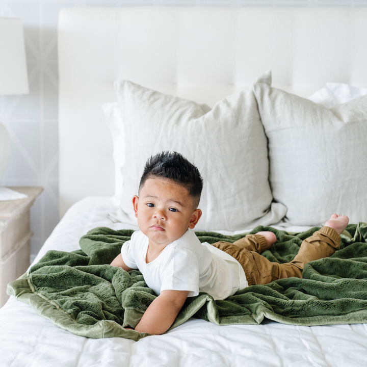 Keep your toddler cozy with the Saranoni Lush Toddler Blanket in Fern, a best toddler blanket for naps and play.