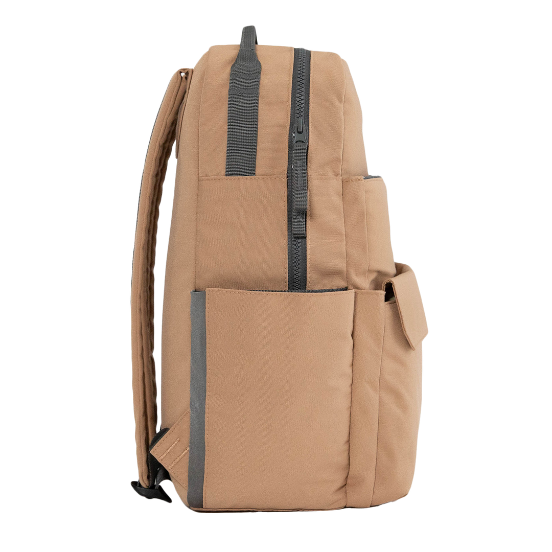 Side angle of Little Unicorn Red Rovr Roo Backpack - Toffee highlighting roomy compartments perfect for kid backpacks.