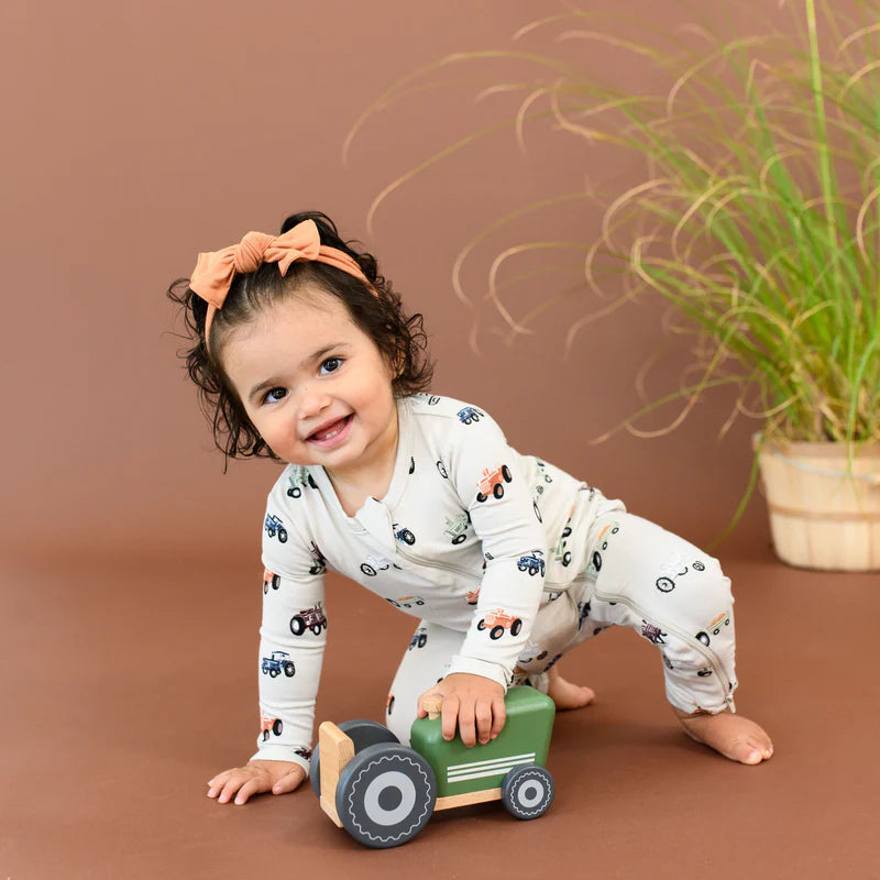 Kyte baby romper in Tractor