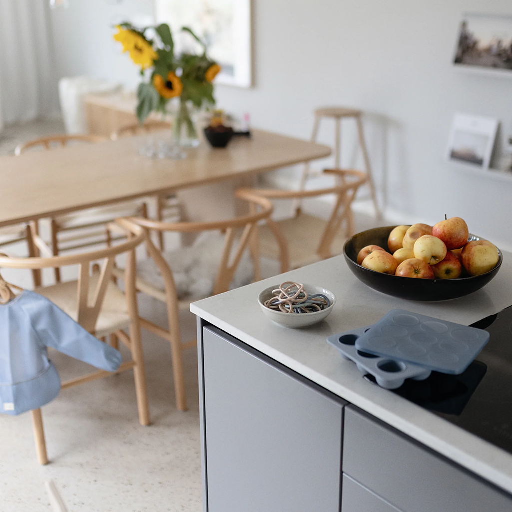 blue Mushie baby freezer tray in kitchen