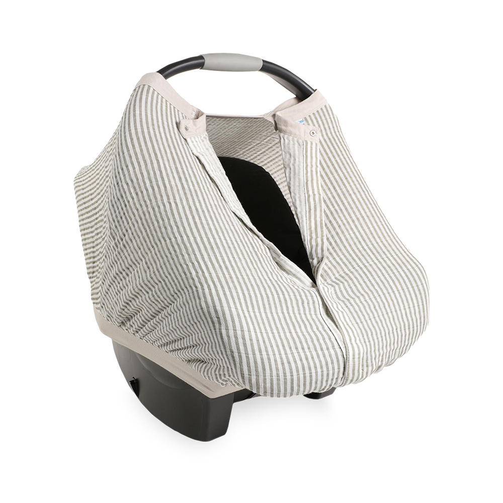 Close-up of the Little Unicorn Cotton Muslin Car Seat Canopy - Grey Stripe highlighting soft, breathable fabric for baby car seat comfort.