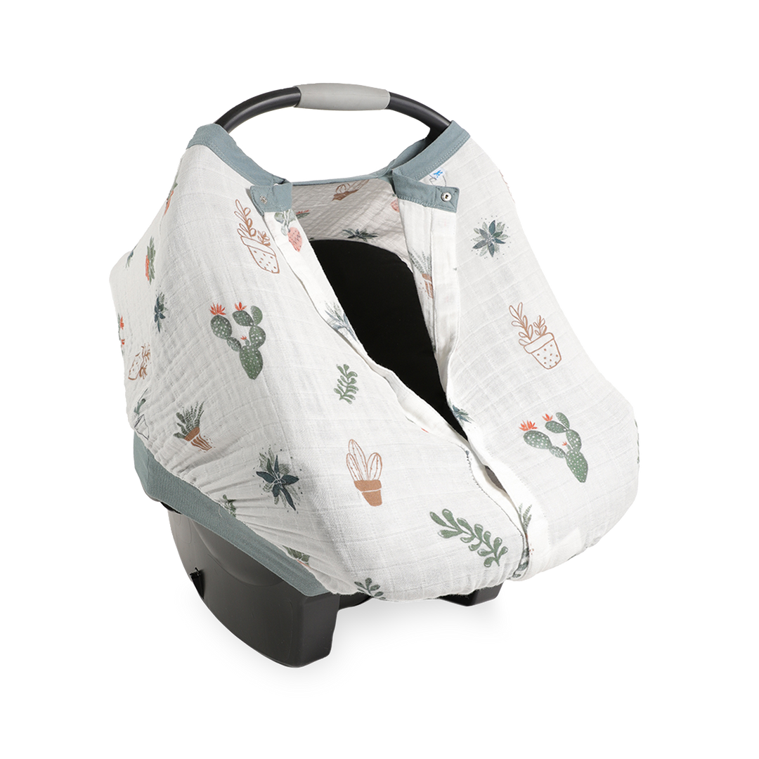 Close-up of the Little Unicorn Cotton Muslin Car Seat Canopy - Prickle Pots highlighting soft, breathable fabric for baby car seat comfort.