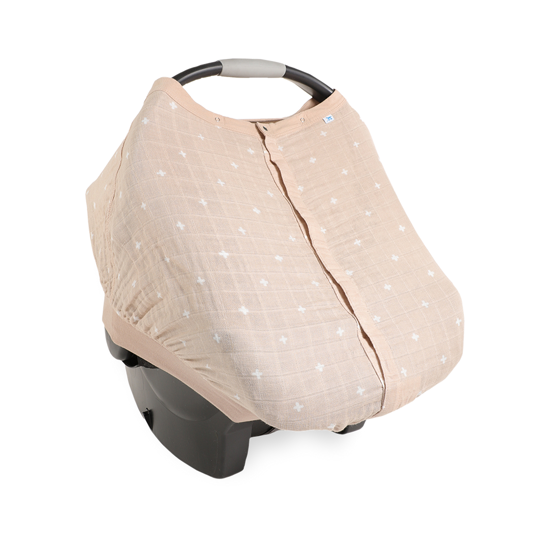 Little Unicorn Cotton Muslin Car Seat Canopy - Taupe Cross shown in a minimalist neutral print, ideal for modern car seat canopy style.