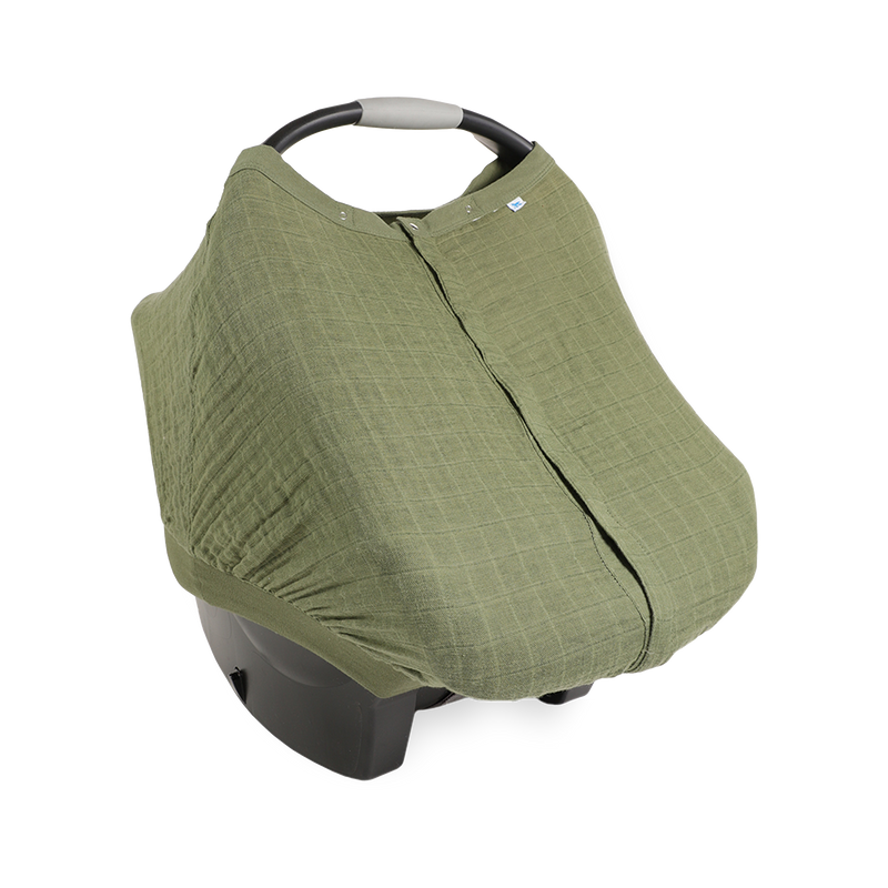 Little Unicorn Cotton Muslin Car Seat Canopy - Fern shown in a soft green botanical print, perfect for stylish car seat canopy coverage.