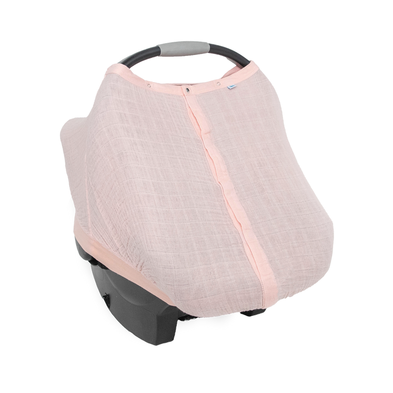 Little Unicorn Cotton Muslin Car Seat Canopy - Light Pink shown in a soft blush hue, perfect for stylish car seat canopy coverage.