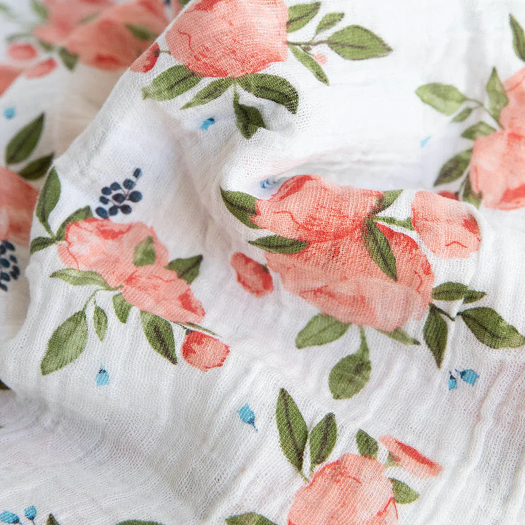 Little Unicorn muslin swaddle blankets in Watercolor Roses, cozy for babies.