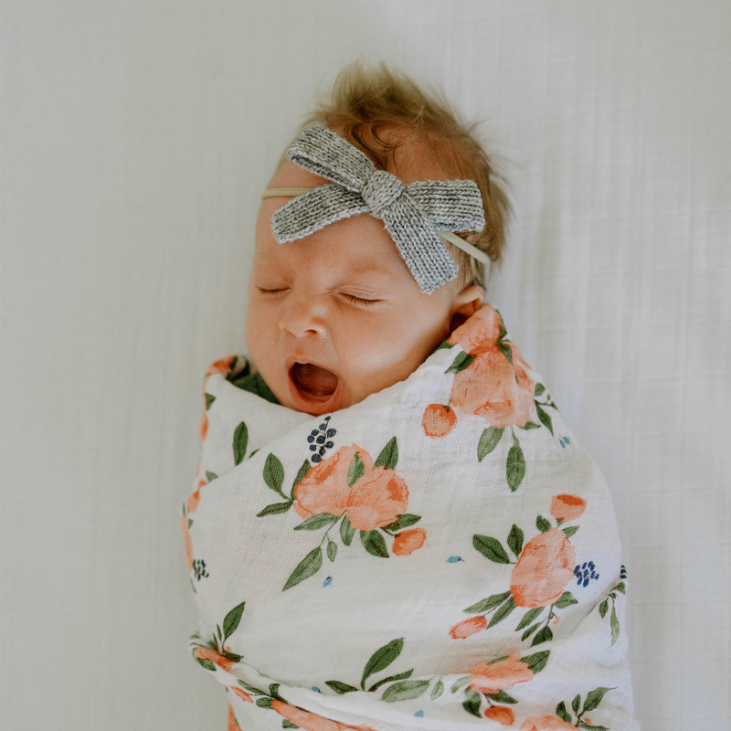 Soft muslin swaddle blankets by Little Unicorn in Watercolor Roses, perfect for newborns.