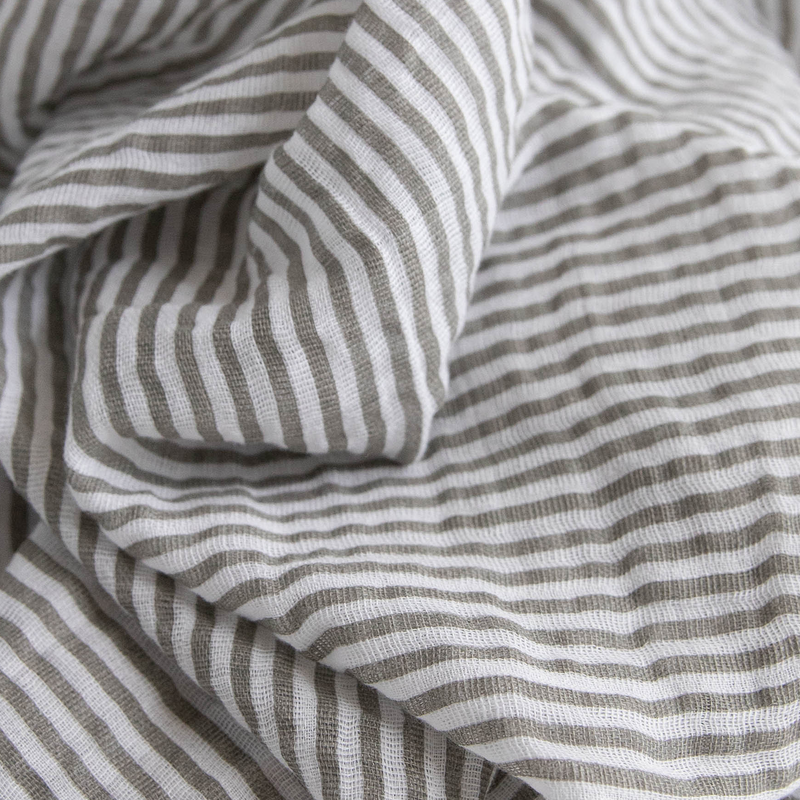 Lightweight muslin swaddle by Little Unicorn, featuring the Watercolor Roses design.