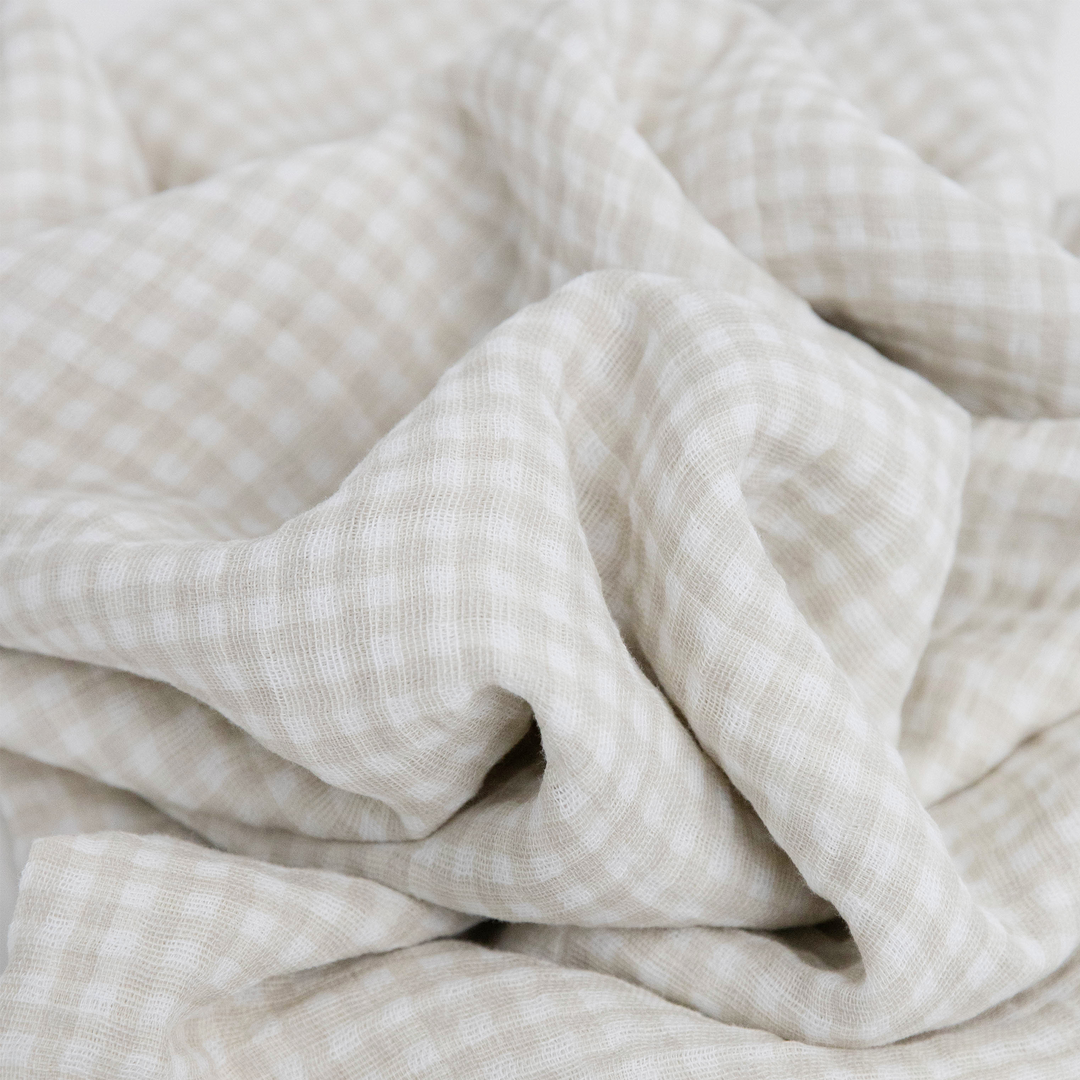 Wrap your baby in Little Unicorn Farmyard Muslin Swaddle Blanket 3 Pack, swaddling muslin blanket