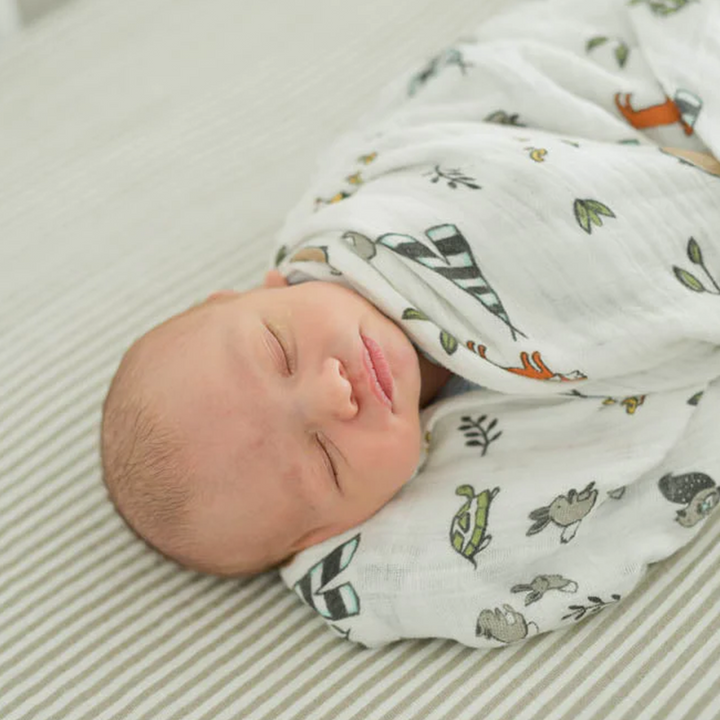Little Unicorn swaddling muslin blanket - Forest Friends, soft and breathable for newborns.