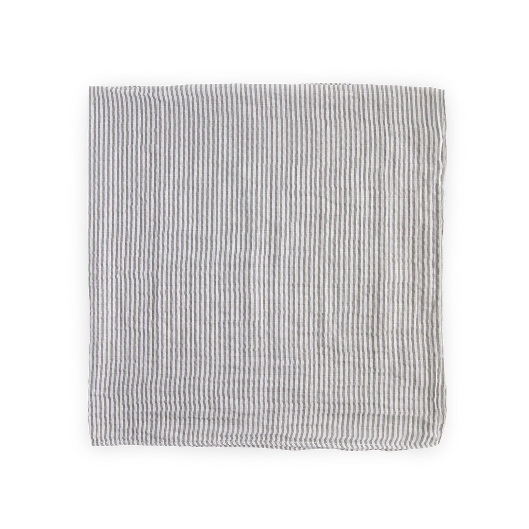 Wrap your baby in comfort with this Little Unicorn muslin baby blanket - Grey Stripe.