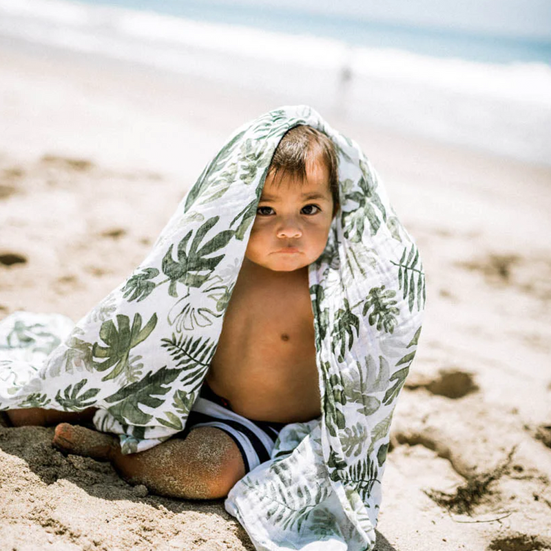 Tropical Leaf Cotton Muslin Swaddle Blanket by Little Unicorn, versatile muslin baby blankets for comfort.
