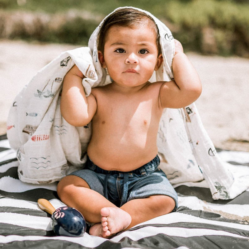 Wrap your baby in Little Unicorn Shark 2 Muslin Swaddle Blanket 3 Pack, swaddling muslin blanket