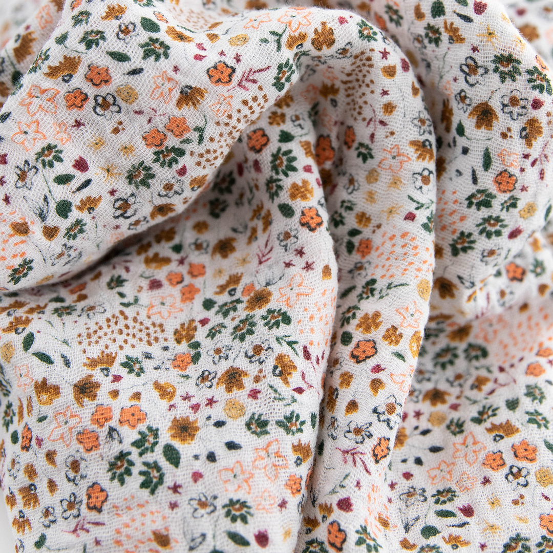 Pressed Petals muslin blanket by Little Unicorn, gentle and breathable for babies.