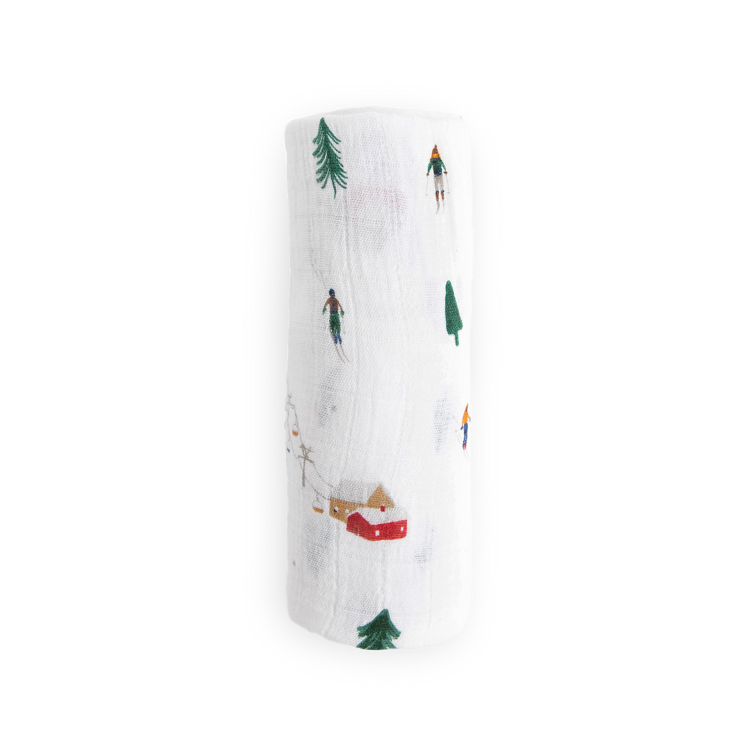 Soft muslin baby blankets by Little Unicorn, featuring the Powder Party design for swaddling.