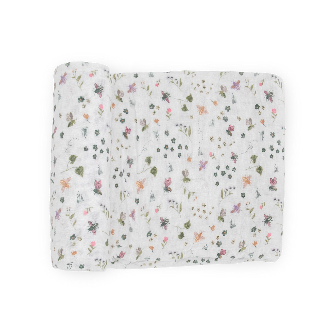 Little Unicorn Cotton Muslin Swaddle Blanket - Garden Bees with soft muslin for swaddling infants.