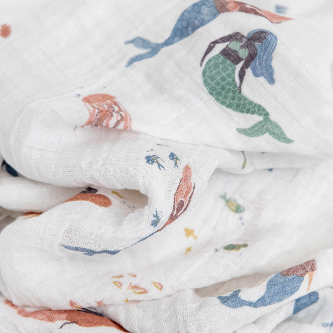 Cozy Little Unicorn Mermaids muslin blankets, perfect for gentle infant swaddling.