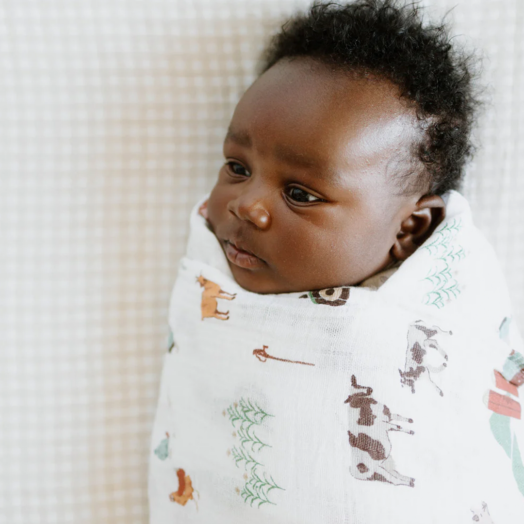 Little Unicorn muslin swaddle in Farmyard design, perfect as muslin blankets baby use.
