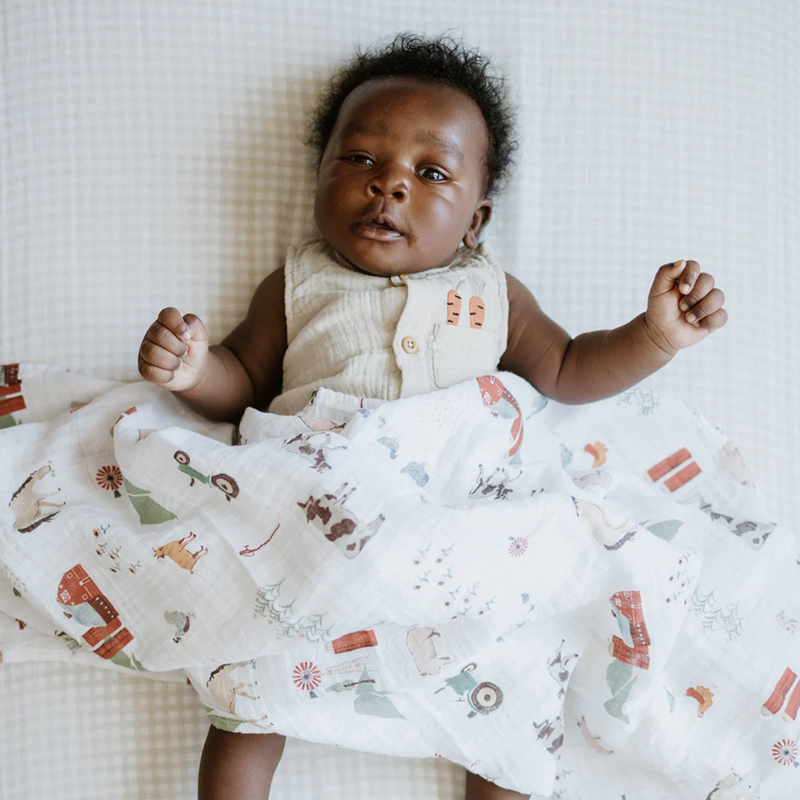 Premium Cotton Muslin Swaddle Blanket – Farmyard by Little Unicorn, versatile baby blanket for swaddling.