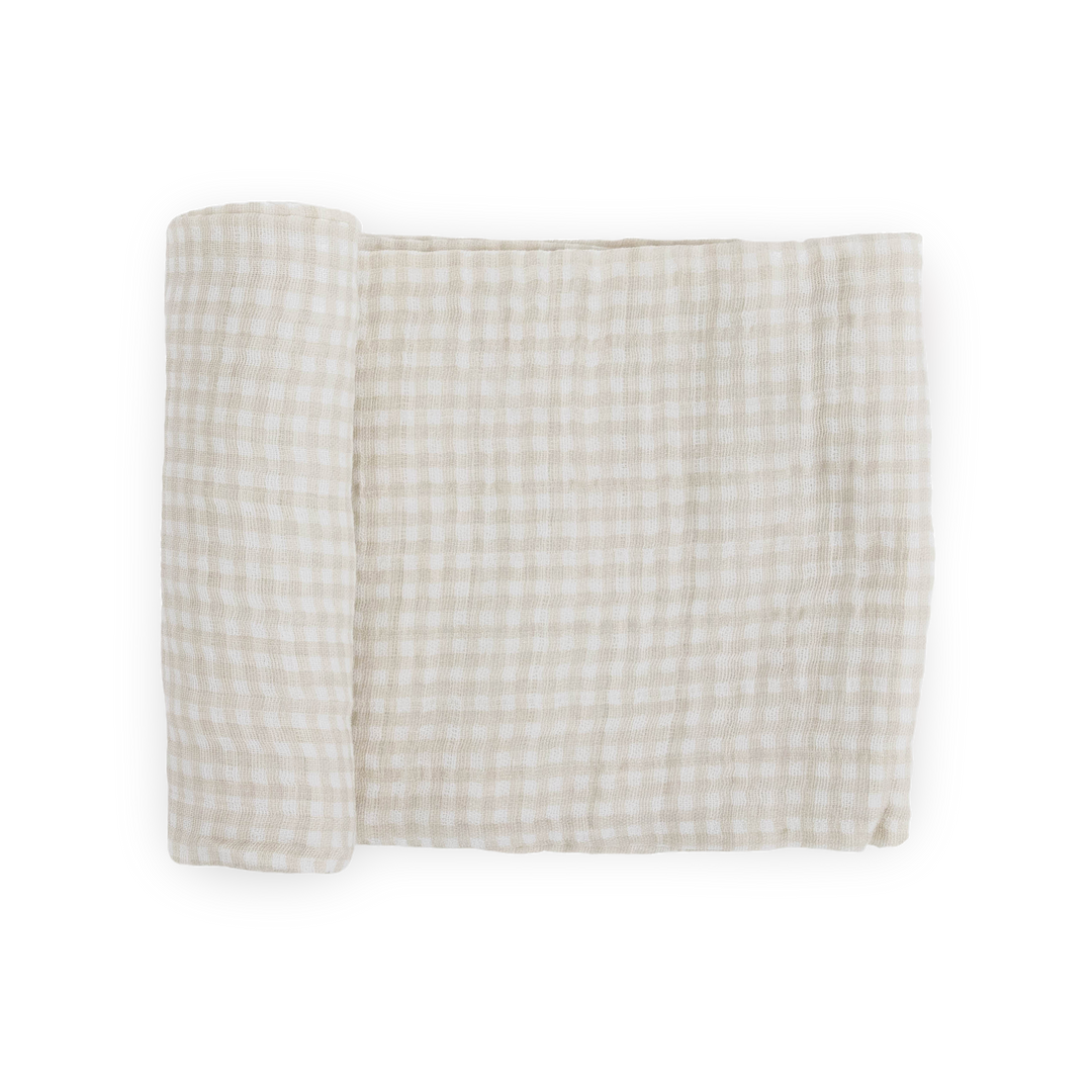 Little Unicorn Cotton Muslin Swaddle Blanket - Tan Gingham, soft muslin swaddle for infants.