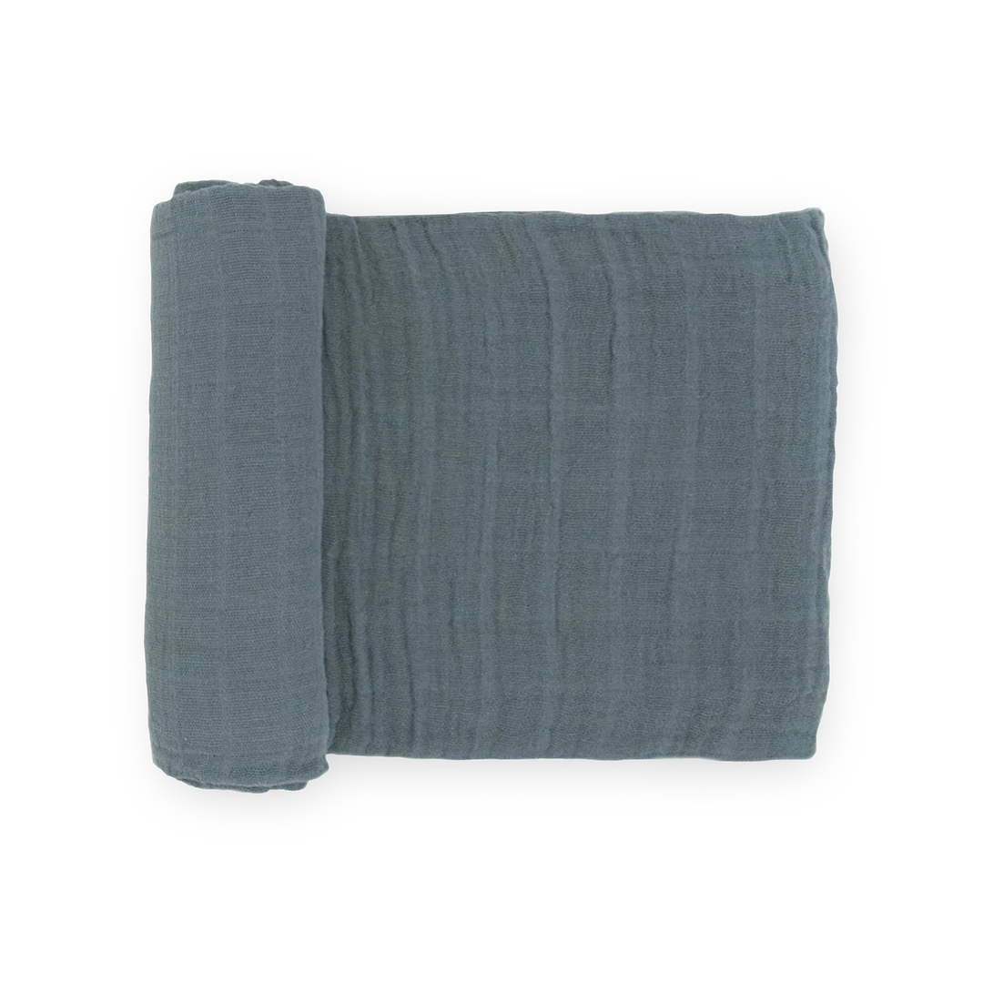 Little Unicorn Cotton Muslin Swaddle Blanket - Sea, soft muslin swaddle for newborns.