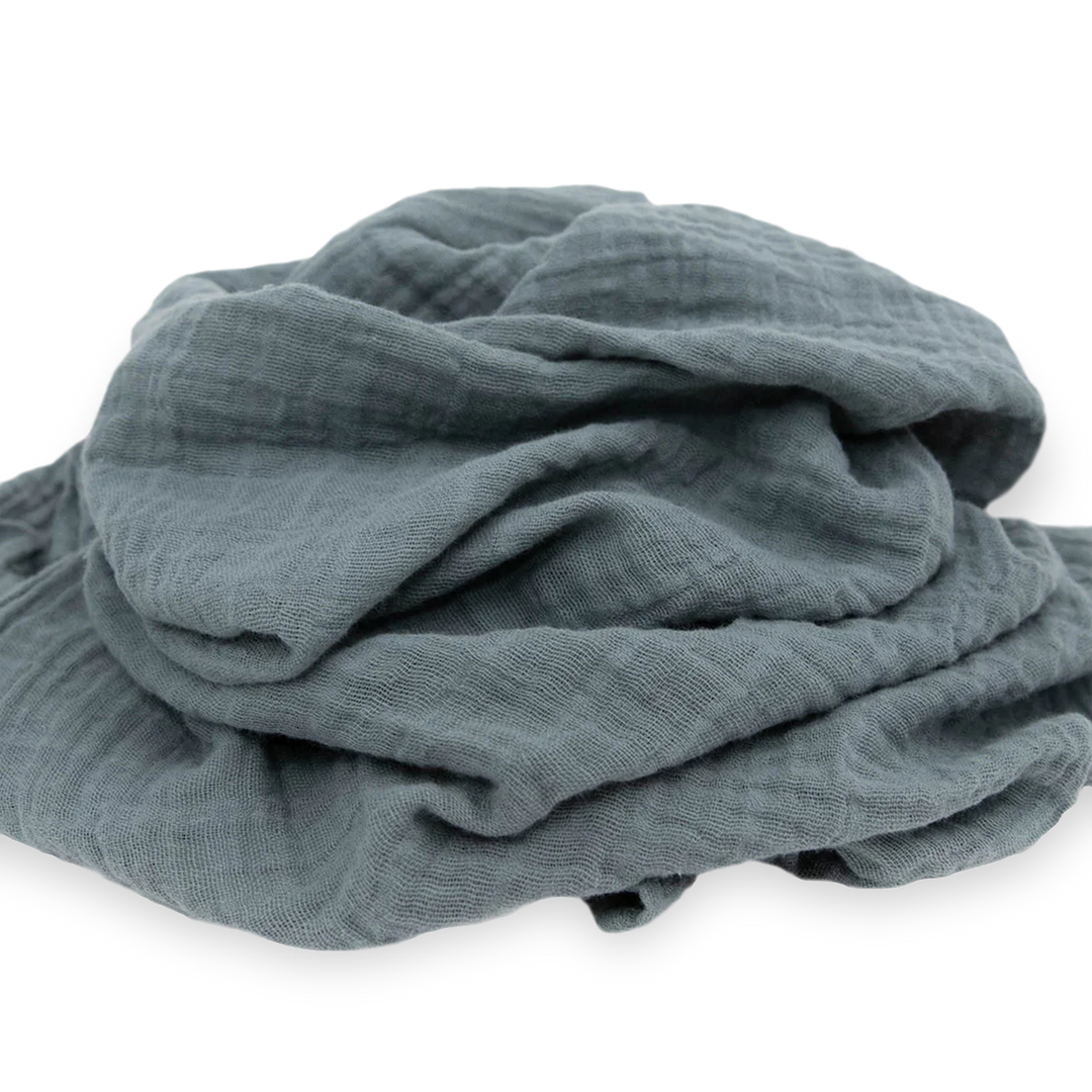 Cozy Sea muslin blankets by Little Unicorn, ideal for gentle infant swaddling.
