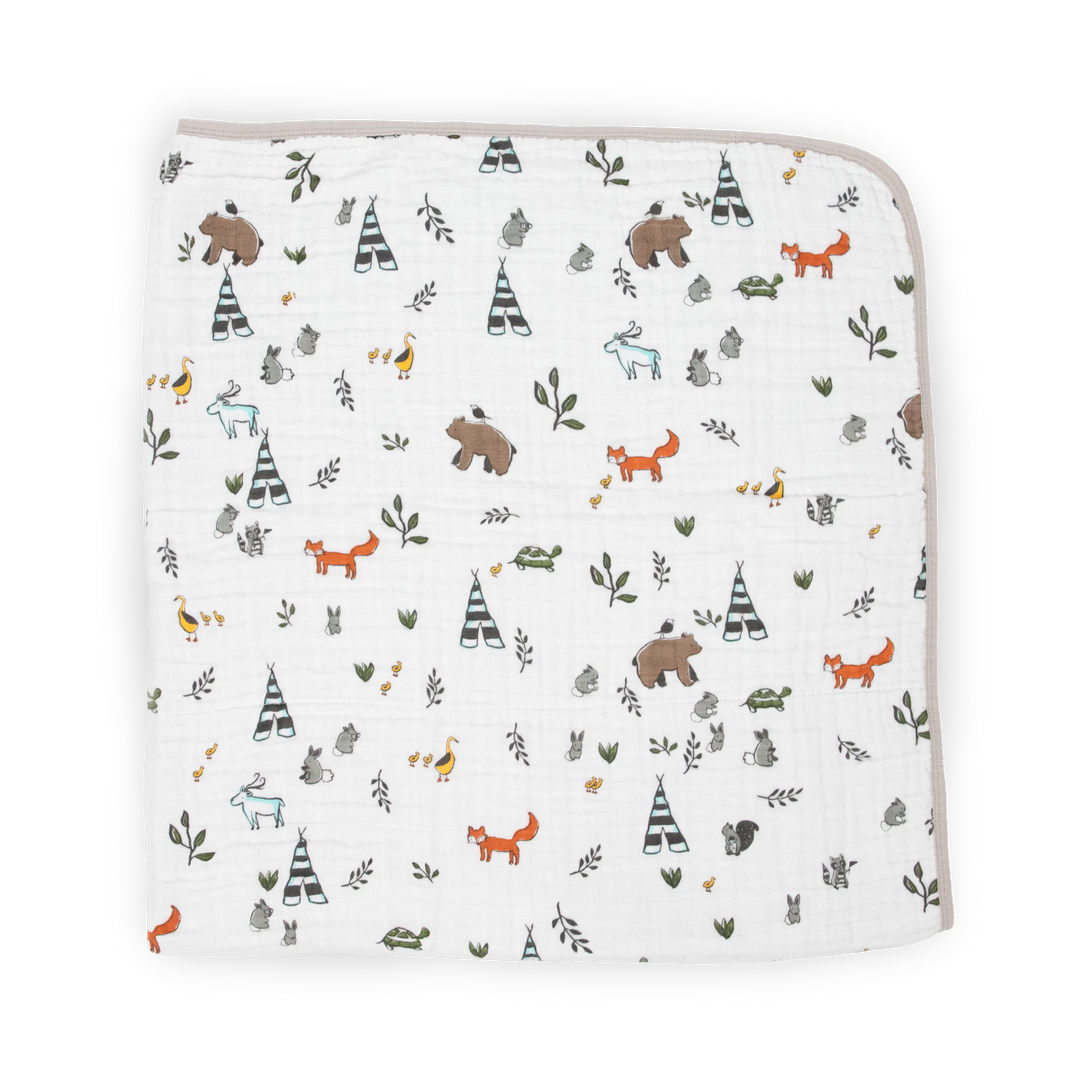 Close-up of Little Unicorn Original Cotton Muslin Quilt - Forest Friends, showcasing the soft texture of premium muslin baby blankets.