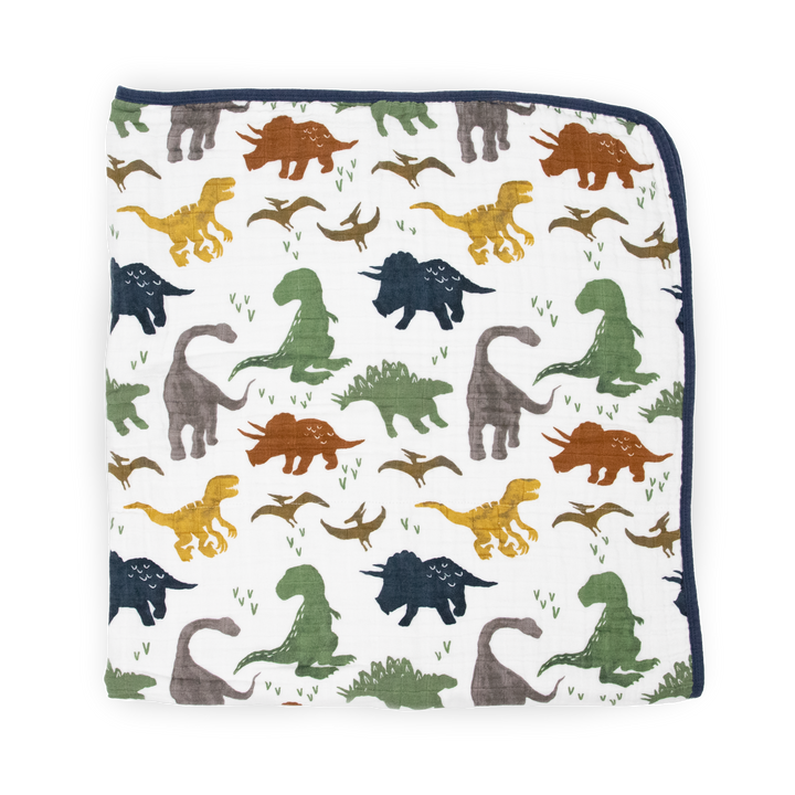 Close-up of Little Unicorn Original Cotton Muslin Quilt - Dino Friends, showing premium cotton texture of these soft muslin baby blankets.