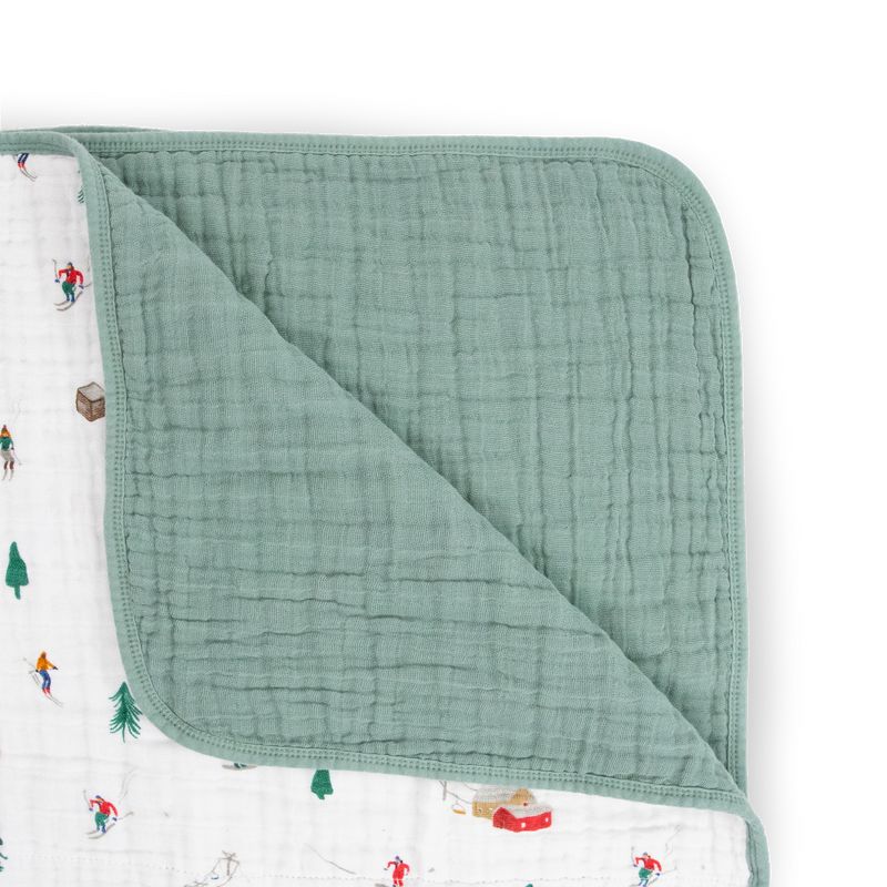 The Little Unicorn Original Cotton Muslin Quilt - Powder Party displayed in full, a lightweight muslin blanket ideal for everyday snuggles.