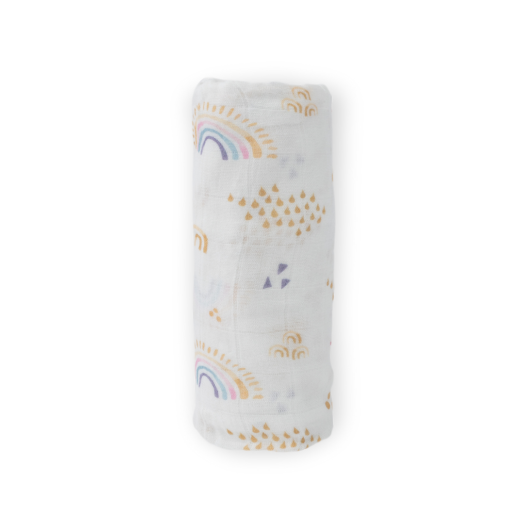 Wrap your baby in Little Unicorn Rainbows & Raindrops Deluxe Muslin Swaddle Blanket, swaddling muslin blanket