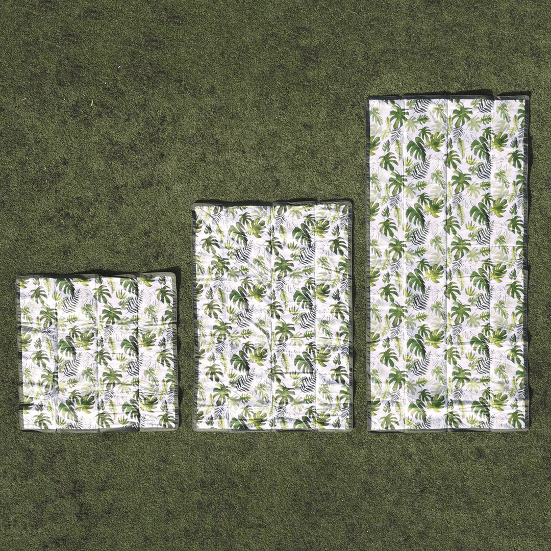 Little Unicorn Tropical Leaf Outdoor Blanket, foldable and waterproof, the perfect waterproof blanket outdoor for any adventure.