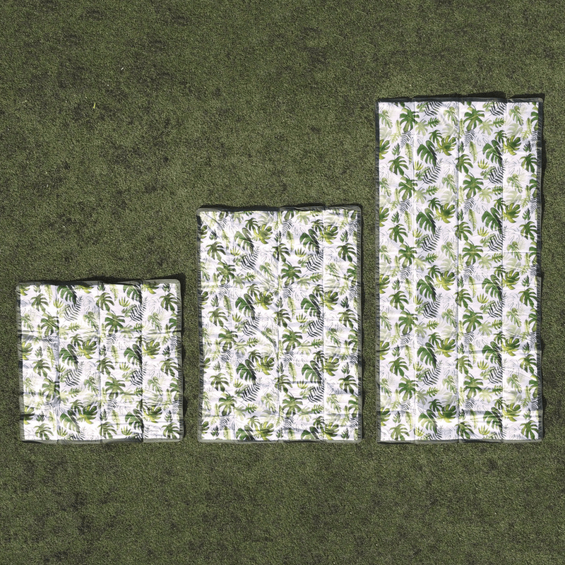 Little Unicorn Tropical Leaf Outdoor Blanket, foldable and waterproof, the perfect waterproof blanket outdoor for any adventure.