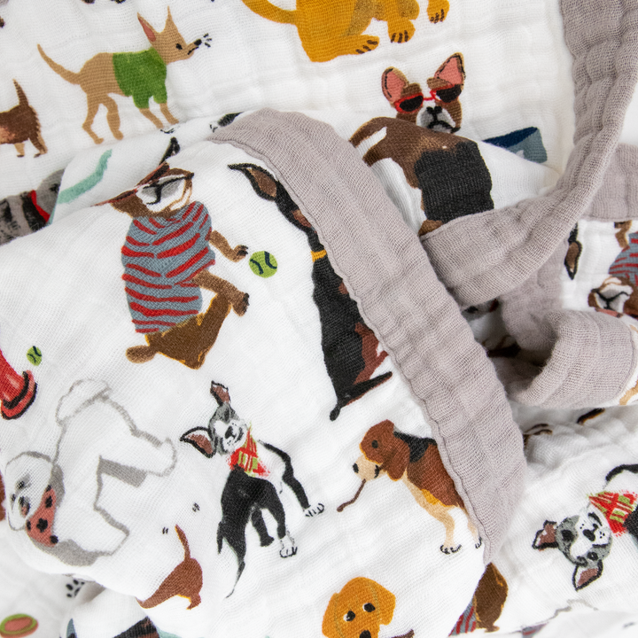 Soft and snuggly, the Little Unicorn Cotton Muslin Quilted Throw - Woof keeps infants warm and comfy.