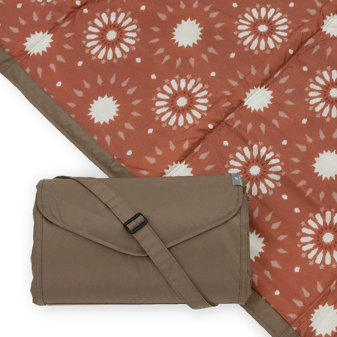 Enjoy outdoor moments with Little Unicorn Sun Baked Outdoor Blanket, a waterproof outdoor blanket for picnics or travel.