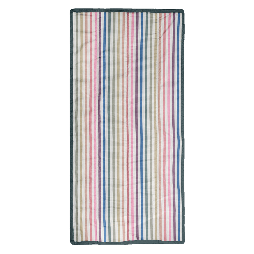 Folded and ready to go, this Little Unicorn Outdoor Blanket - Chroma Rugby Stripe is a stylish waterproof outdoor blanket.