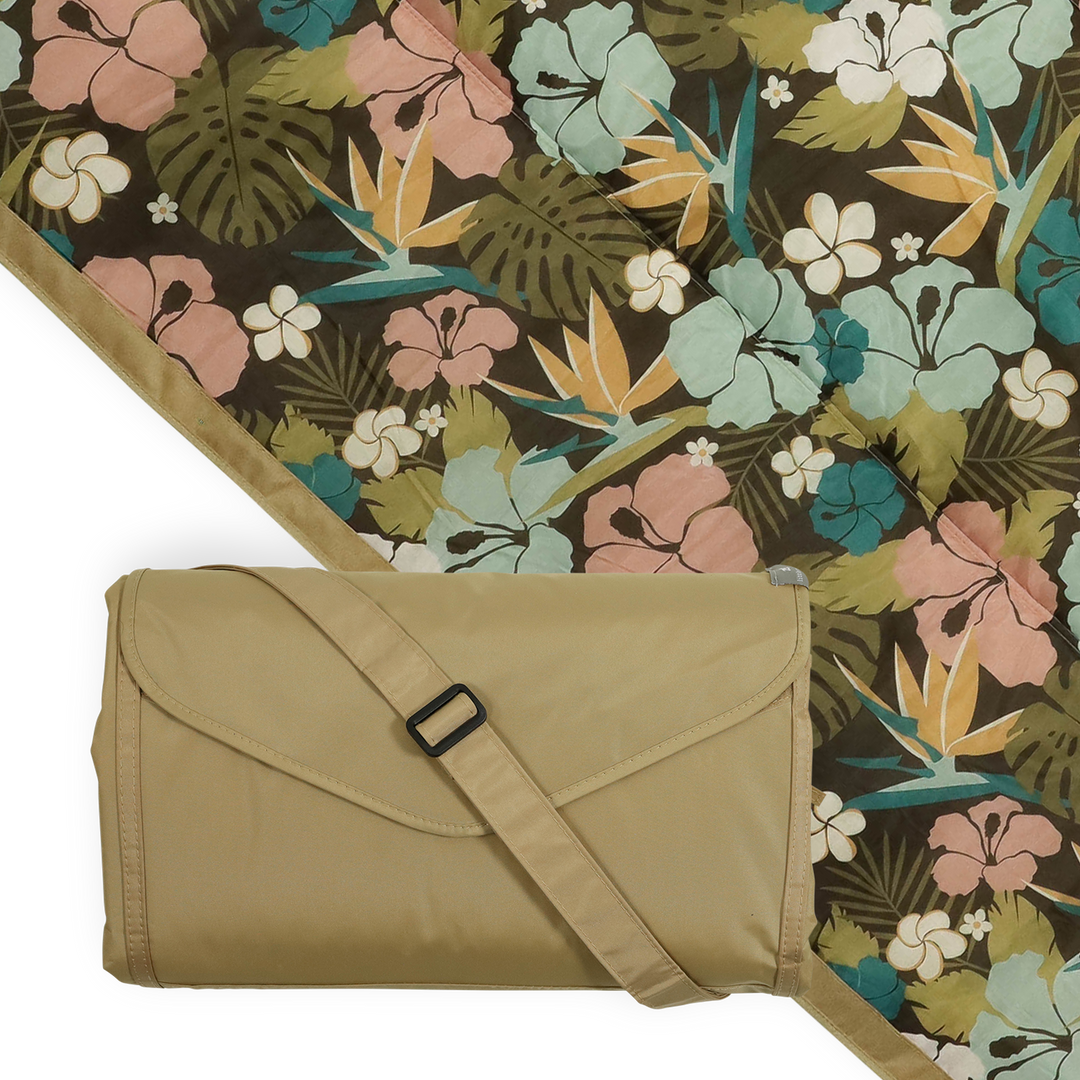 Little Unicorn Outdoor Blanket - Hibiscus spread on grass, perfect outdoor blanket for picnics and family fun.