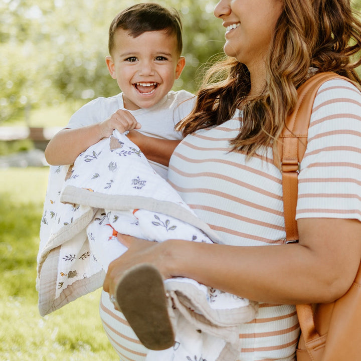 Adorable Little Unicorn Cotton Muslin Baby Quilt - Forest Friends featuring woodland animals, the perfect muslin quilt for little ones.