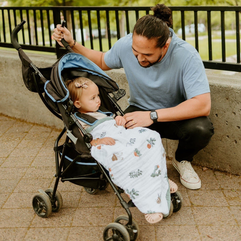 Adorable cactus-themed Little Unicorn Cotton Muslin Baby Quilt - Prickle Pots, a must-have muslin quilt for nursery or stroller use.