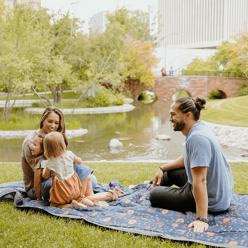 Cozy Midnight Poppy outdoor throw blanket by Little Unicorn, soft and durable outdoor blankets for family fun