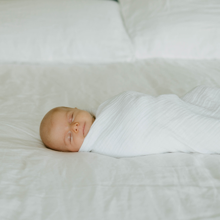 Little Unicorn Organic Cotton Muslin Swaddle Blanket in White, versatile swaddle cloth muslin.